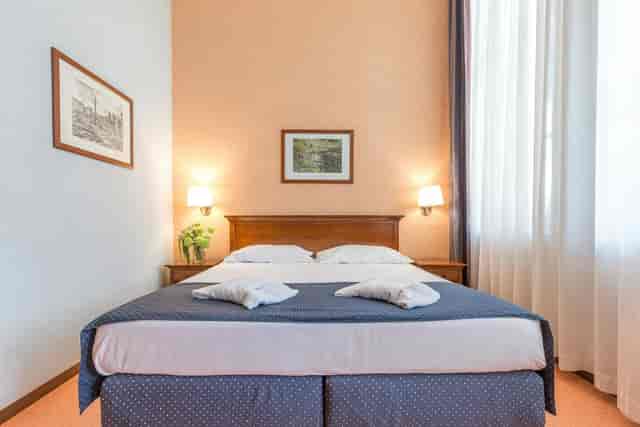 Hotel Villa Eur private chapel, functional guest room for corporate business events and lodging.
