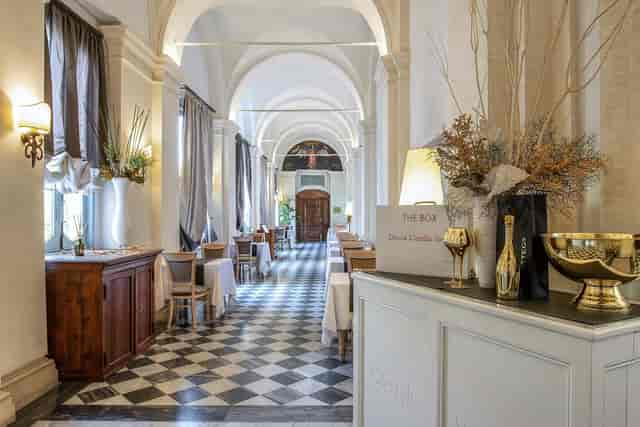 Historic Sala Agrumeto event space with checkerboard floors for luxury weddings and corporate galas.