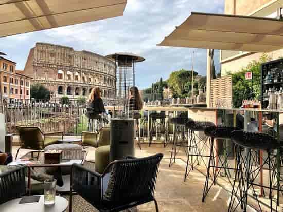 Luxury cocktail bar at The Court with Colosseum views for VIP networking events.