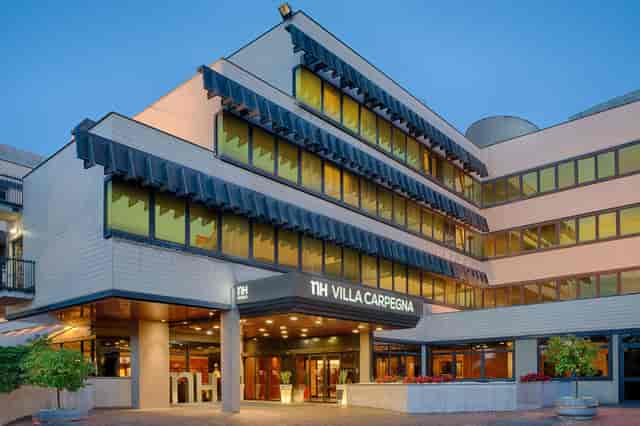 NH Roma Villa Carpegna hotel exterior with porte-cochère for corporate meetings and event venues.