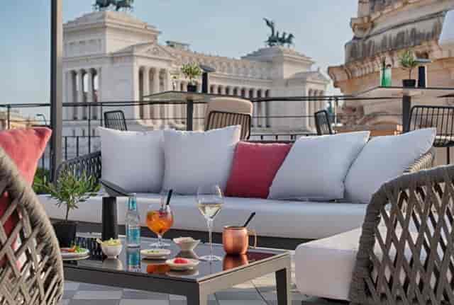 Luxury rooftop lounge in Rome for corporate cocktail receptions and networking events.