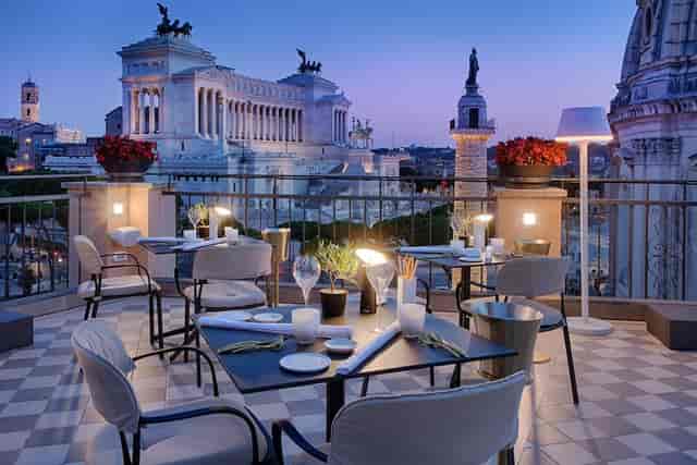 Rooftop luxury suite in Rome with panoramic views for executive receptions and incentive dinners.