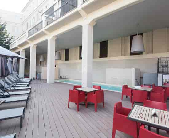 Gourmand’s Restaurant terrace with lap pool for networking receptions and cocktail events.