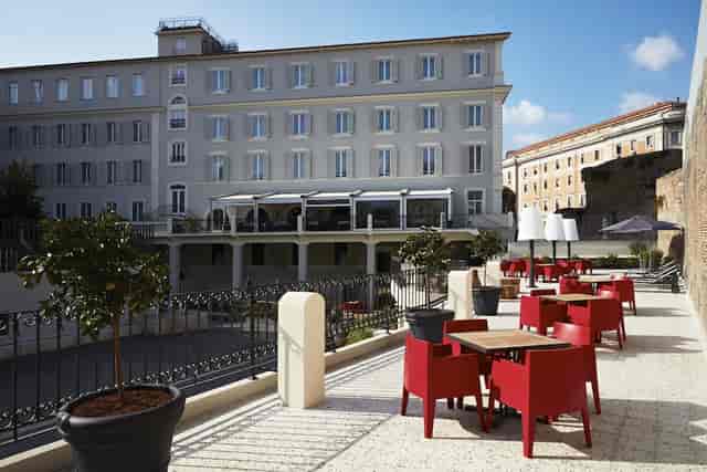 Modern lounge bar terrace for corporate networking and event breakout space.