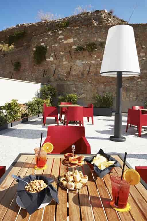 High-end meeting room with outdoor terrace for corporate networking and cocktail events.