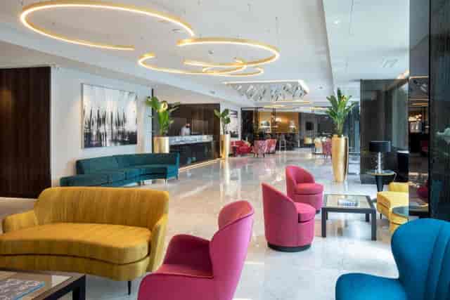Modern Sala Repubblica hotel lobby for high-end networking and professional conference events.