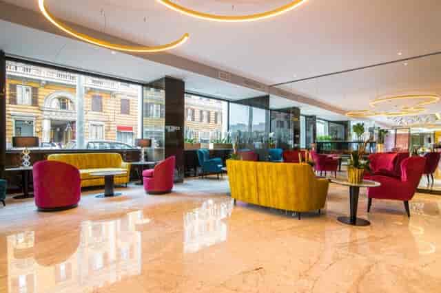 Modern hotel lobby with lounge seating for networking and professional pre-function events.
