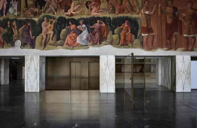 Historic Foyer Kennedy at Palazzo dei Congressi with grand murals for luxury event venue hire.