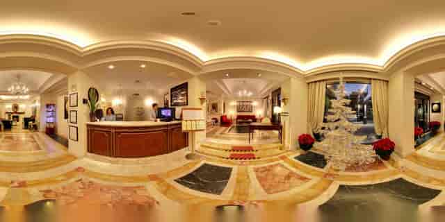 Belli Room at Trilussa Palace Hotel: elegant lobby for boutique events and executive retreats.