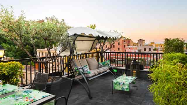 Rooftop breakout space at Trilussa Palace Hotel for luxury corporate incentive networking events.