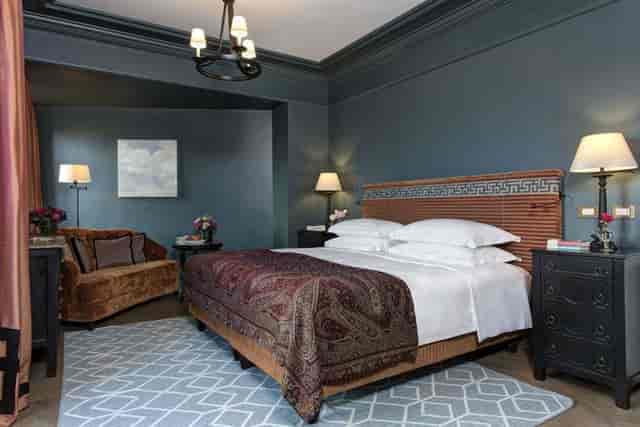 Luxury boutique hotel room for executive events and VIP accommodations in Rome.