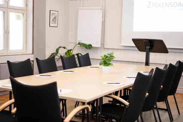 Henning boardroom setup with ergonomic table for professional corporate meetings and events.