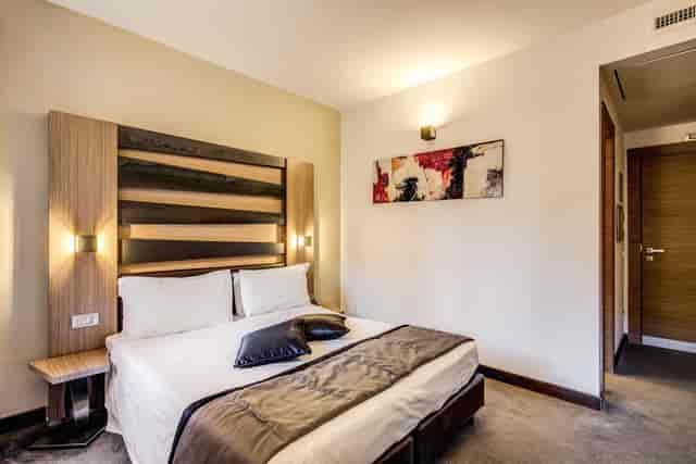 Modern hotel suite with minimalist design for business conferences and corporate events.