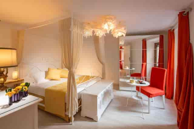 VIP boutique hotel suite with work alcove for executive travel and site inspections.