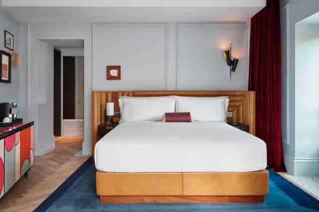 Luxury W Rome suite, boutique executive guest room for VIP retreats and professional events.