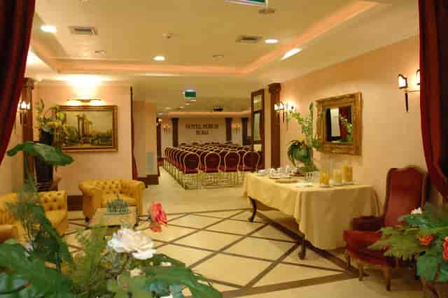 Corporate meeting room in Hotel Forum with theater seating for business presentations.