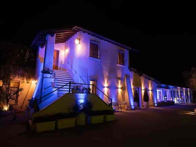Villa Parco della Vittoria entrance hall with architectural uplighting for gala receptions.