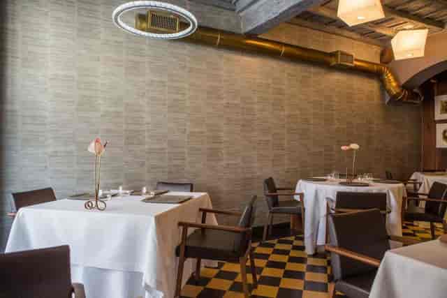 High-end restaurant interior for VIP dinner or executive luncheon with industrial-chic design.