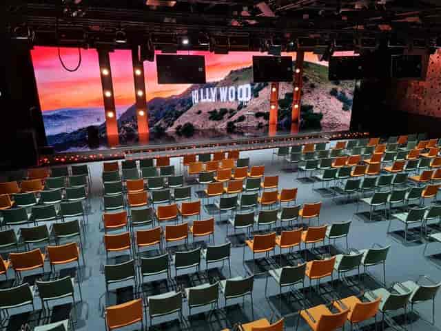 Gyllene Salen LED backdrop and theater seating for corporate keynote and brand presentation.