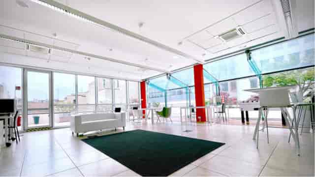 Area 211 breakout space in Newton Factory with modular furniture for workshops and networking.