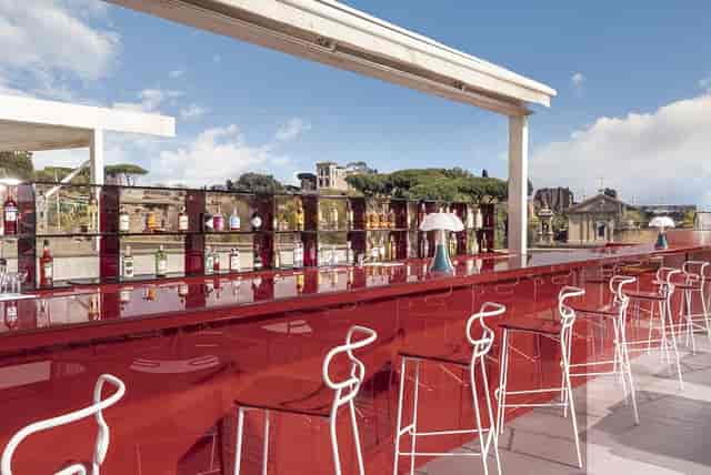 Luxury rooftop bar with panoramic views for networking events and cocktail parties.