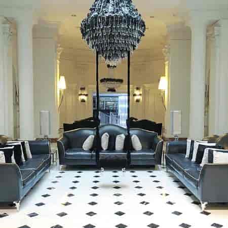 Luxury hotel lobby foyer for upscale event registration and VIP breakout areas.