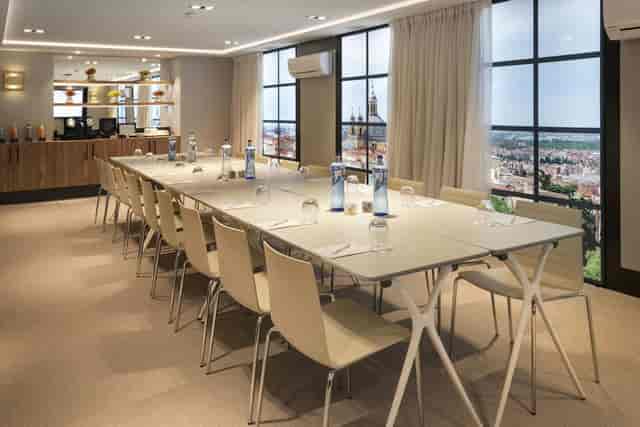 Modern boardroom with city views at Bávaro, Catalonia Gran Vía Madrid for executive meetings.