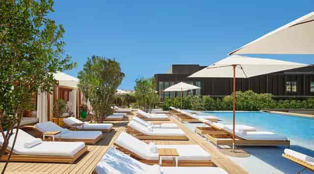 Luxury hotel pool deck at The Madrid EDITION for VIP networking and corporate incentive events.