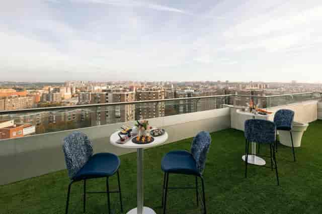 Rooftop breakout space at Tucán Madrid for VIP networking and cocktail events with city views.