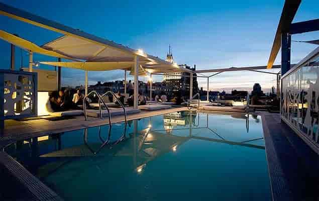 Rooftop terrace at Room Mate Óscar, ideal for upscale networking and corporate event venues.