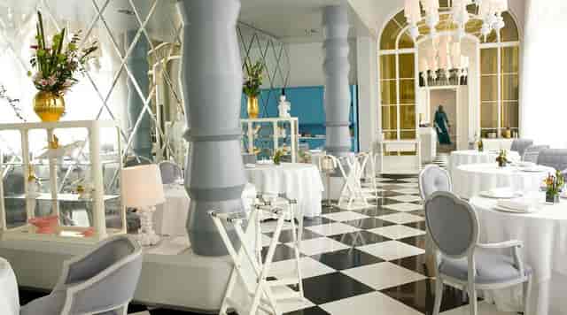 La Bodega: Elegant checkerboard dining space for VIP corporate luncheons and plated dinners.