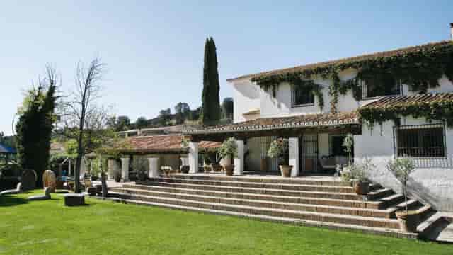 Luxury La Finca El Bosque conference room with grand staircase for boutique corporate retreats.