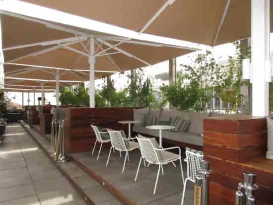 Rooftop bar lounge at ME Madrid, perfect for high-end outdoor networking events and receptions.