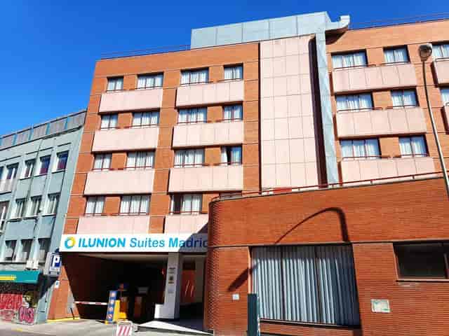 ILUNION Suites Madrid exterior: modern corporate meeting venue for professional business events.