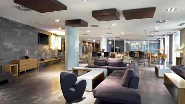 Modern Eurostars Madrid Congress function room with lounge seating for networking and events.
