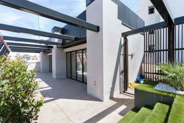 Rooftop Deluxe suite with private terrace at Casa Almagro, luxury hotel event venue.