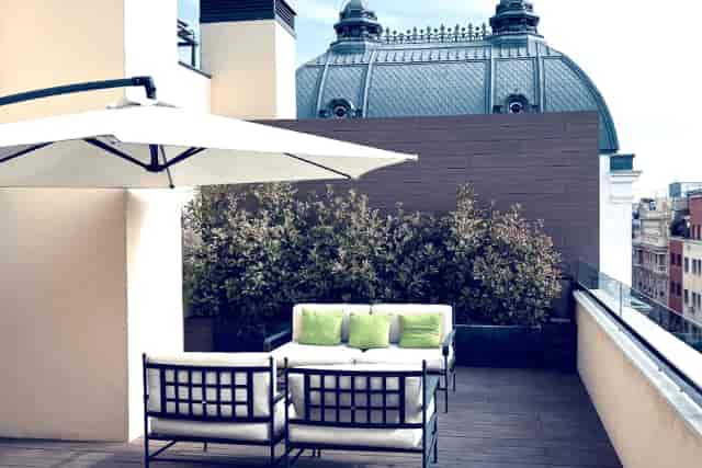 Rooftop Deluxe terrace with scenic urban views, perfect for VIP receptions and networking events.