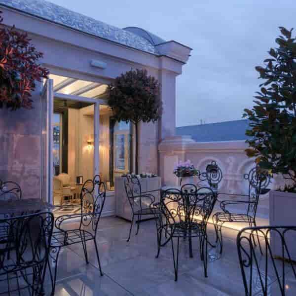 Luxury rooftop terrace at Heritage Madrid Hotel for VIP receptions and exclusive breakout sessions.