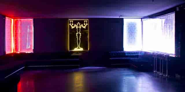 Neon-lit VIP lounge at Sala Panda Club, perfect for exclusive after-parties and networking events.