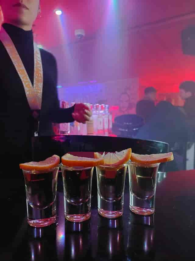Branded staff and atmospheric lighting at Sala Panda Club experiential event activation.