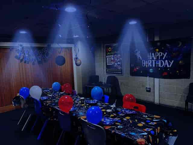 Planet Ice themed birthday party setup with space-style decor for kids' event venue rental.