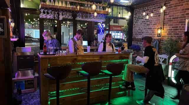 Serendipity cocktail bar with LED lighting, ideal for networking events and corporate receptions.