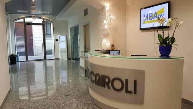 Magenta Hall at Spazio Cairoli: modern reception desk for corporate meetings and networking events.