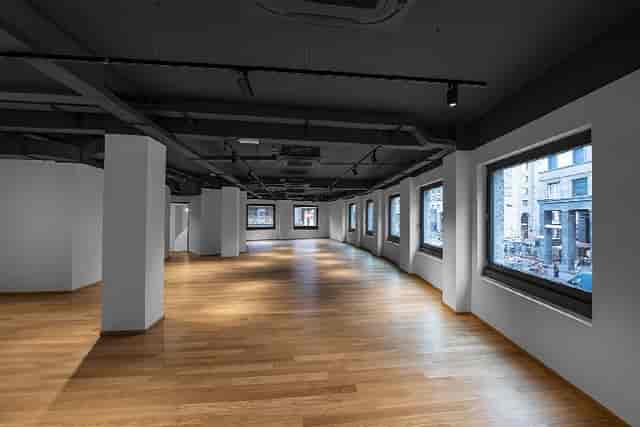 Industrial event space, Spazio San Babila, hardwood floors, corporate workshop and gallery venue.