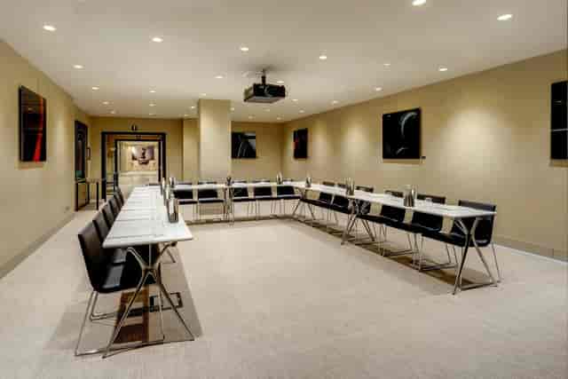 U-shape boardroom at ME Milan Il Duca, ideal for corporate workshops and professional meetings.
