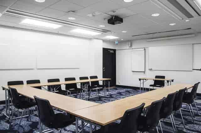 U-shaped meeting room with whiteboards at Hotel C Stockholm for corporate workshops and conferences.