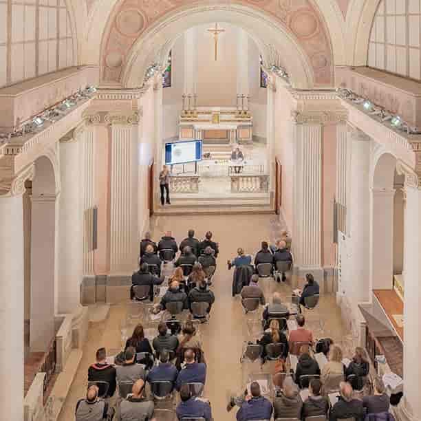 AV setup in Sala dei Milanesi, Duomo di Milano for intimate corporate event presentation.