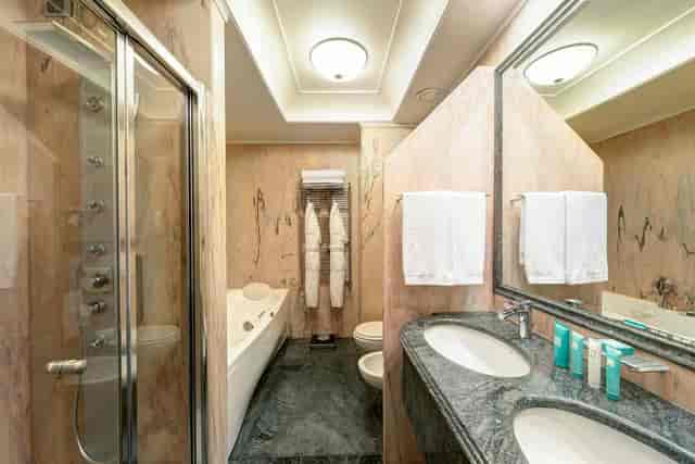 Luxury marble hotel board meeting room for executive corporate events and VIP business conferences.