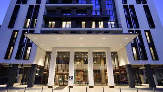 Modern Milano Verticale hotel facade: meeting venue for corporate events and professional conferences.