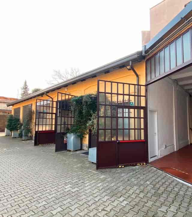 Industrial-chic venue in Officine De Rolandi for private corporate events and brand activations.